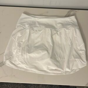 Athleta Run with it 14” skirt small jupe-short run with it